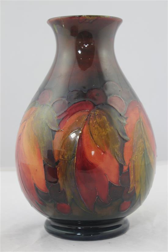 A Moorcroft leaf and berry flambe baluster vase, c.1945-49 24.5cm, rim damage